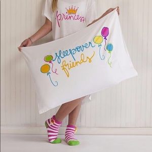Child size nightgown and pillow case.